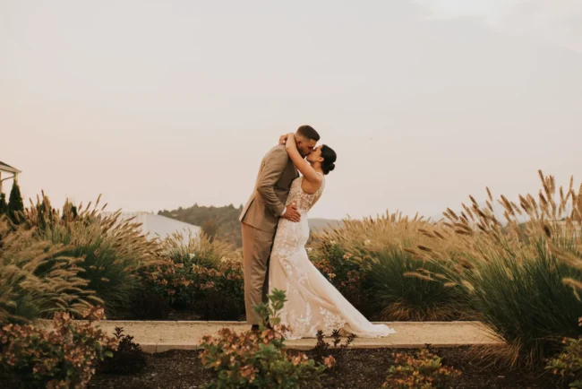 Bride and groom first kiss